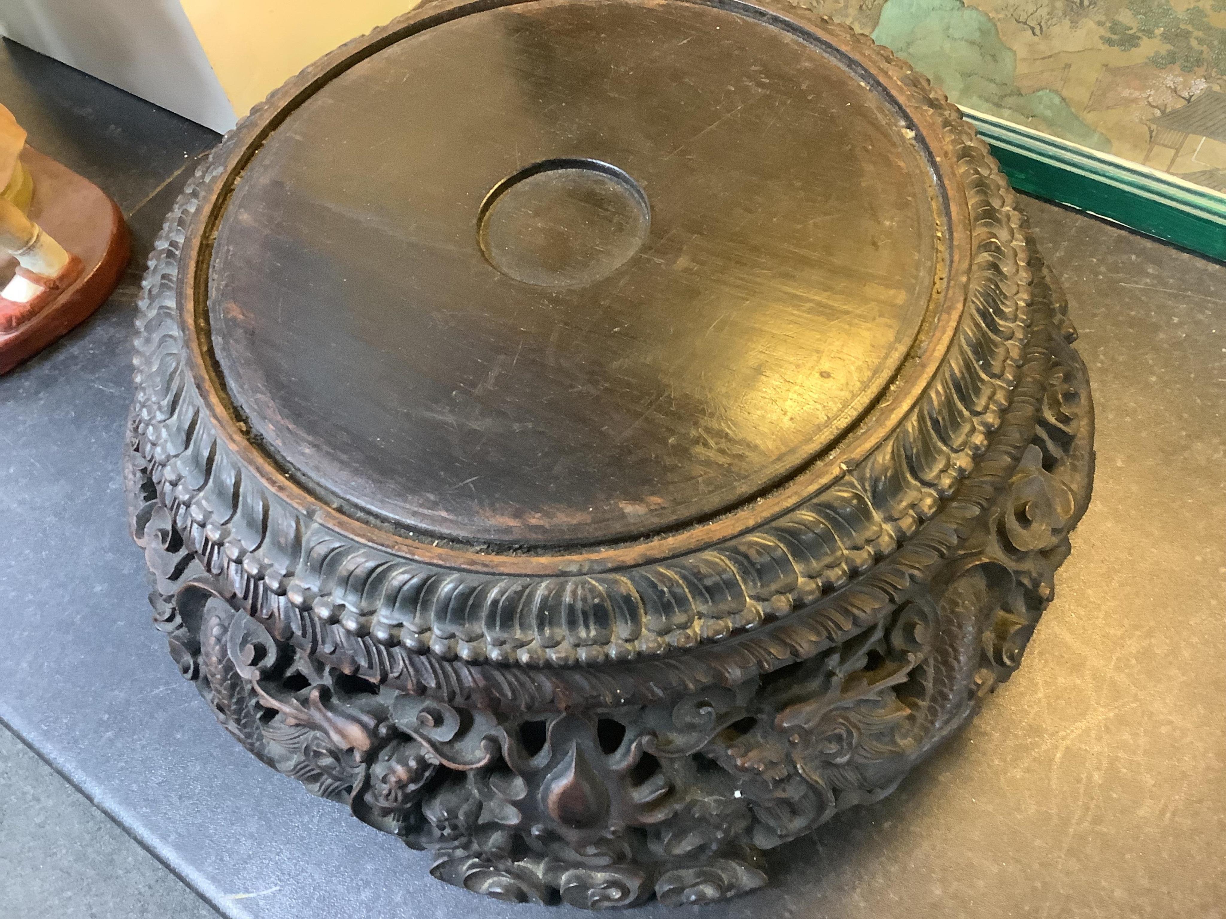 An impressive Chinese hongmu ‘dragon’ stand, late 19th century